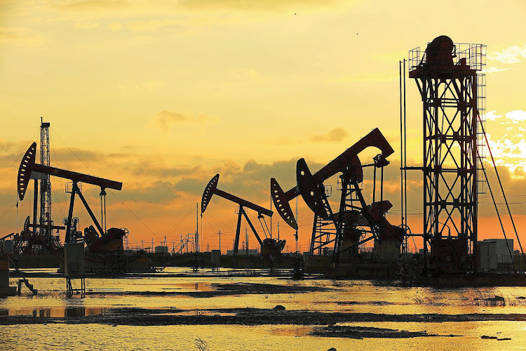 Oil field site, in the evening, oil pumps are runningPicture: 123RF/bondgrunge